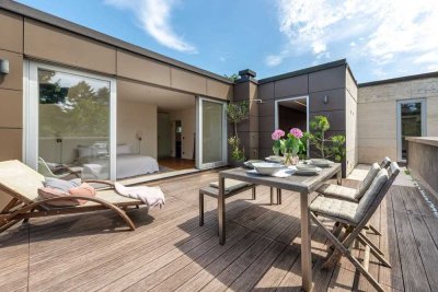 Penthouse-Highlight: Umlaufende Dachterrasse und 360°- Kamin