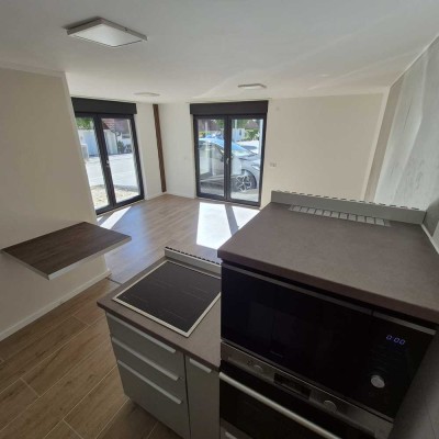 Modernes Ein-Zimmer-Appartment mit PKW Stellplätze in Neubau