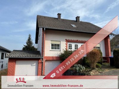 Malborn: Freistehendes Einfamilienhaus in idyllischer Umgebung mit gepflegtem Garten und zwei Garage