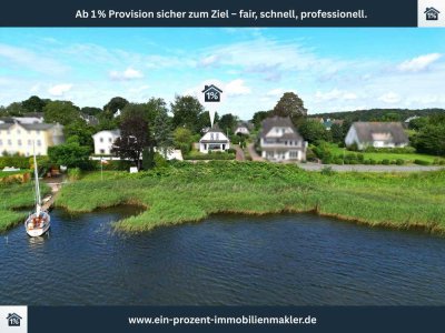 Juwel an der Schlei: EFH mit großer Glasfront und Balkon mit Wasserblick + Nebenhaus in Boren