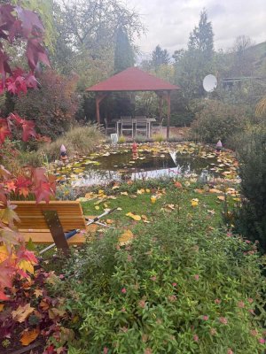 Wohnen wie im Park - Familienidylle mit großem Garten und Einliegerwohnung
