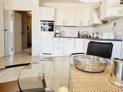RESERVIERT! Exklusive, moderne und strandnah gelegene 3-Zi.-Whg. mit Tiefgaragenstellplatz