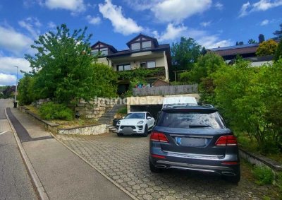 Zweifamilienhaus mit Fernblick, Sauna, Pelletheizung & Garagen