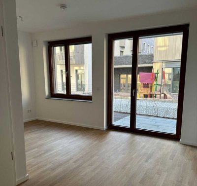 NEUBAU! Lichtdurchflutete Wohnung zum Verweilen mit Garten mit EBK (ablösbar)