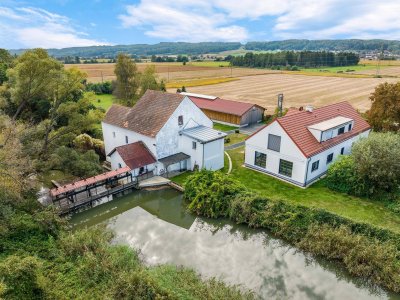 Exklusives Wohnen in Alleinlage: Modernes Landhaus mit eigenem Wasserkraftwerk &amp; vielseitigen Nutzungsmöglichkeiten