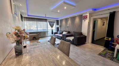Elegante 3,5-Zimmer-Wohnung mit Balkon, Einbauküche und Garage