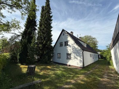 Einfamilienhaus mit Werkstatt und 3 Garagen auf 915 QM Grundstück in Augsburg / Hochzoll