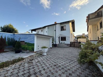 3 Zimmerwohnung mit separatem Verkaufs- oder Gewerberaum im UG, 2 Carport- und 2 Außenstellplätzen