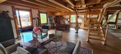 Traumhafte, großzügige Maisonettewohnung mit Dachterrasse und eigenem Garten!