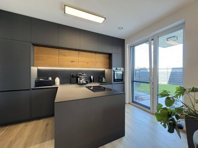 Traumhafte Garten-Wohnung inkl. 2 Tiefgaragenstellplätze