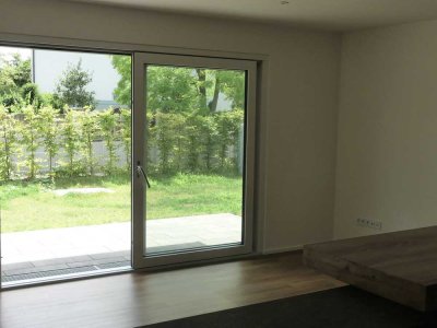 Moderne 3- ZKB mit Terrasse und Garten