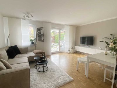 Wohlfühlwohnen: 2-Zimmer-Gartenwohnung mit Küche und TG-Stellplatz in begehrter Lage