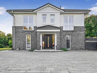 Hier werden Wohnträume wahr: Villa mit modernstem Komfort.  Charmant und exklusiv. Absolutes JUWEL.