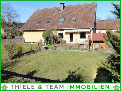 Erdgeschosswohnung mit Garten + Garage
