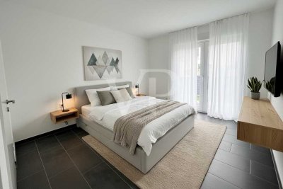 Neuwertige Erdgeschosswohnung mit Terrasse und Tiefgaragenstellplatz