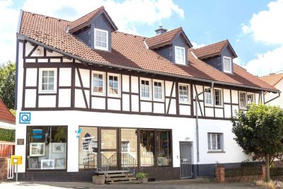 Eigentumswohnung mit Ladengeschäft im gepfl. Wohn-/Geschäftshaus (451 m² Gesamtfläche / 97 m² Wfl.)