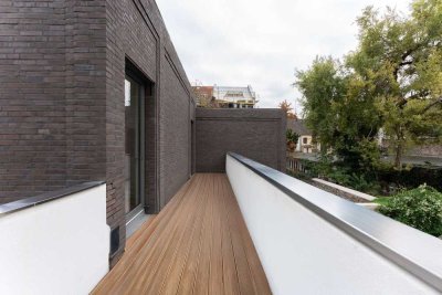 Architektonisches Highlight - Wohnjuwel mit on-top Dachterrasse und Balkon