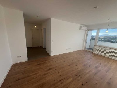 Hochwertig renovierte 2-Zimmer Wohnung mit perfekten Blick auf den Taunus und Klimaanlage