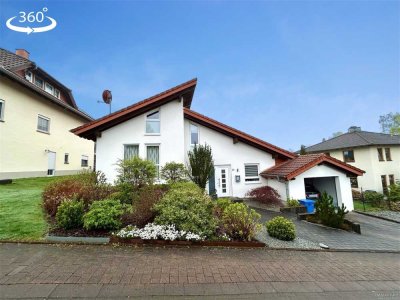 Neuwertiges Einfamilienhaus in sehr gutem Zustand mit Garage und Garten - sofort bezugsfrei