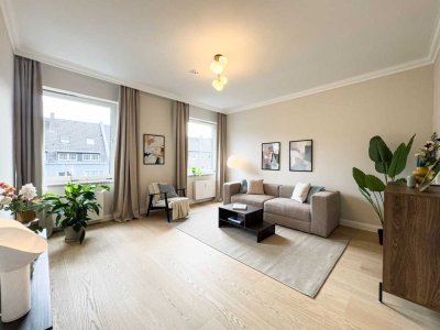 Exklusives Wohnen im Düsseldorfer Zooviertel – Stilvoll sanierte Altbauwohnung mit Balkon ins Grüne