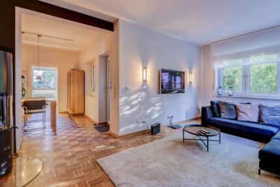 Renovierte Erdgeschosswohnung mit Garten & TG-Stellplatz – Vermietetes Altbaujuwel in zentraler Lage