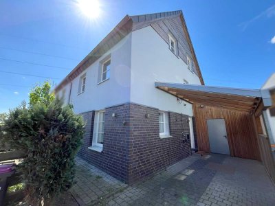 Optimal konzipiert! Energiesparende Doppelhaushälfte mit PV-Anlage und Carport in Borghorst