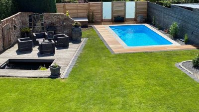 Attraktiver Bungalow mit Einliegerwohnung und exklusiver Gartenanlage in Lachendorf