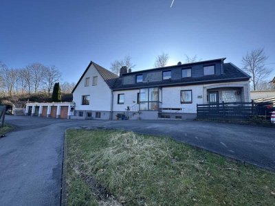 " Ein interessantes  Paket " Einfamilienhaus + 2 DHH + Garagen  in SG-Lehn!