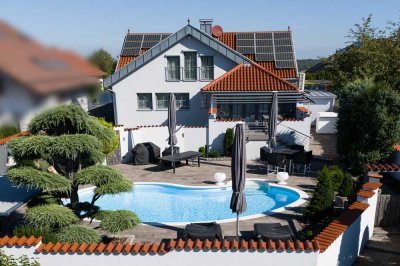 Luxuriöses Einfamilienhaus mit traumhafter Pooloase und exklusivem Wohnambiente!