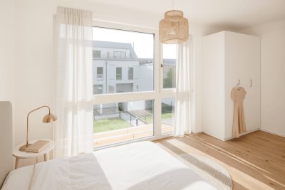 Grün soweit das Auge reicht - Stadtvilla mit kühlem Komfort