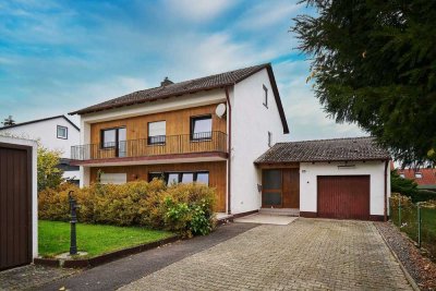 Vielseitiges Zweifamilienhaus mit großem Garten in ruhiger Lage von Geiselhöring