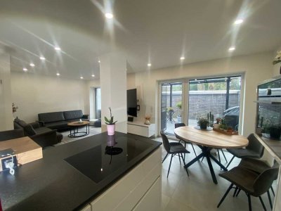 Exclusive Parterrewohnung mit großem Wintergarten in Zentrumslage