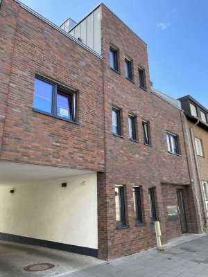 Schöne Erdgeschosswohnung mit Terrasse in zentraler Lage