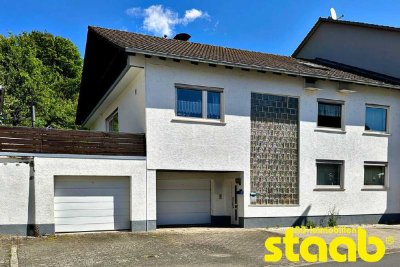 1-FAMILIENHAUS MIT EINLIEGERWOHNUNG IM DACHGESCHOSS - GARAGEN UND GARTEN