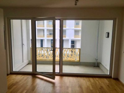 Neuwertige 1-Zimmer-Etagenwohnung mit Balkon und Tiefgaragenstellplatz