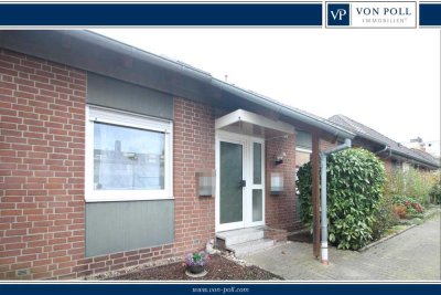 Gepflegtes Zweifamilienhaus mit separaten Wohneinheiten, Garten und Garagen