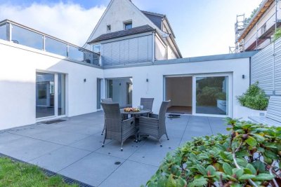 Erstbezug nach Kernsanierung! 3,5-Zimmer-Wohnung mit ca. 132 m², großer Terrasse, Garten