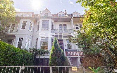Einmalige 6,5-Zimmer-Altbau-Wohnung mit wunderschönem Garten und Doppelgarage in beliebter Lage