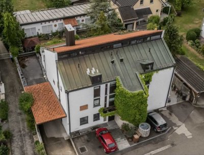 Einzigartiges Mehrfamilienhaus in zentraler Lage