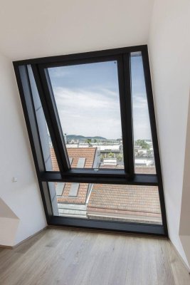Traumhafte Dachgeschosswohnung in 1020 Wien: Erstbezug mit Terrasse und Garage!