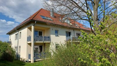 Dachgeschosstraum mit Dachloggia in grüner und ruhiger Umgebung
