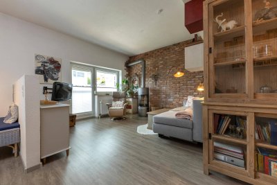 Traumhafte 2-Zi-Wohnung mit großzügiger Terrasse und liebevoll gestaltetem Garten