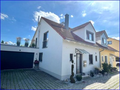 Exklusiv wohnen in Bestlage – hochwertige DHH mit PV, Garage & Top-Ausstattung