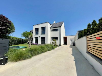 Modernes 186 m² Einfamilienhaus mit Wärmepumpe, Pool, Terrasse &amp; Whirlpool - 7 Autominuten von der Stadtgreneze Wien