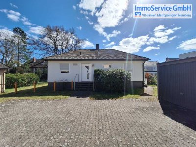 Wohlfühlen auf einer Ebene – Bungalow mit Süd-Terrasse,  Garage und voll unterkellert