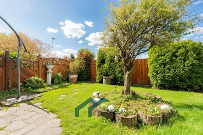 Sehr gepflegte EG-Wohnung mit großem Garten & Wintergarten + Stellplatz