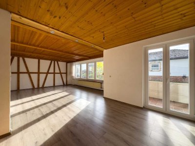 Großzügige Maisonette-Wohnung mit Terrasse und Gartenanteil