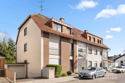 Helle Souterrainwohnung mit Terrasse in zentraler und ruhiger Lage.