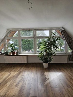 Individuelle Wohnung im Obergeschoss mit ausgebautem Dachgeschoss