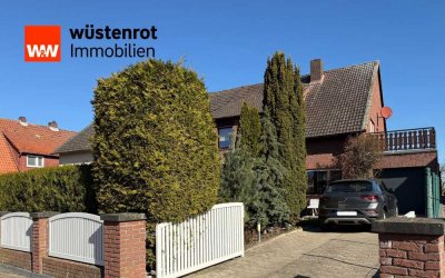 Ein Raumwunder ist diese hübsche gepflegte Doppelhaushälfte mit Garage, Nebengebäude und kl. Garten